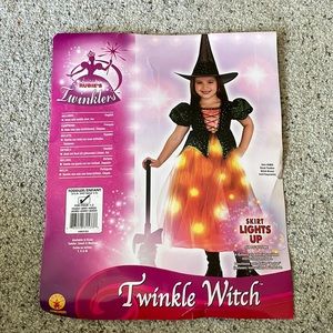 Toddler size light up Witches Costume with sheer hat. Only worn Once